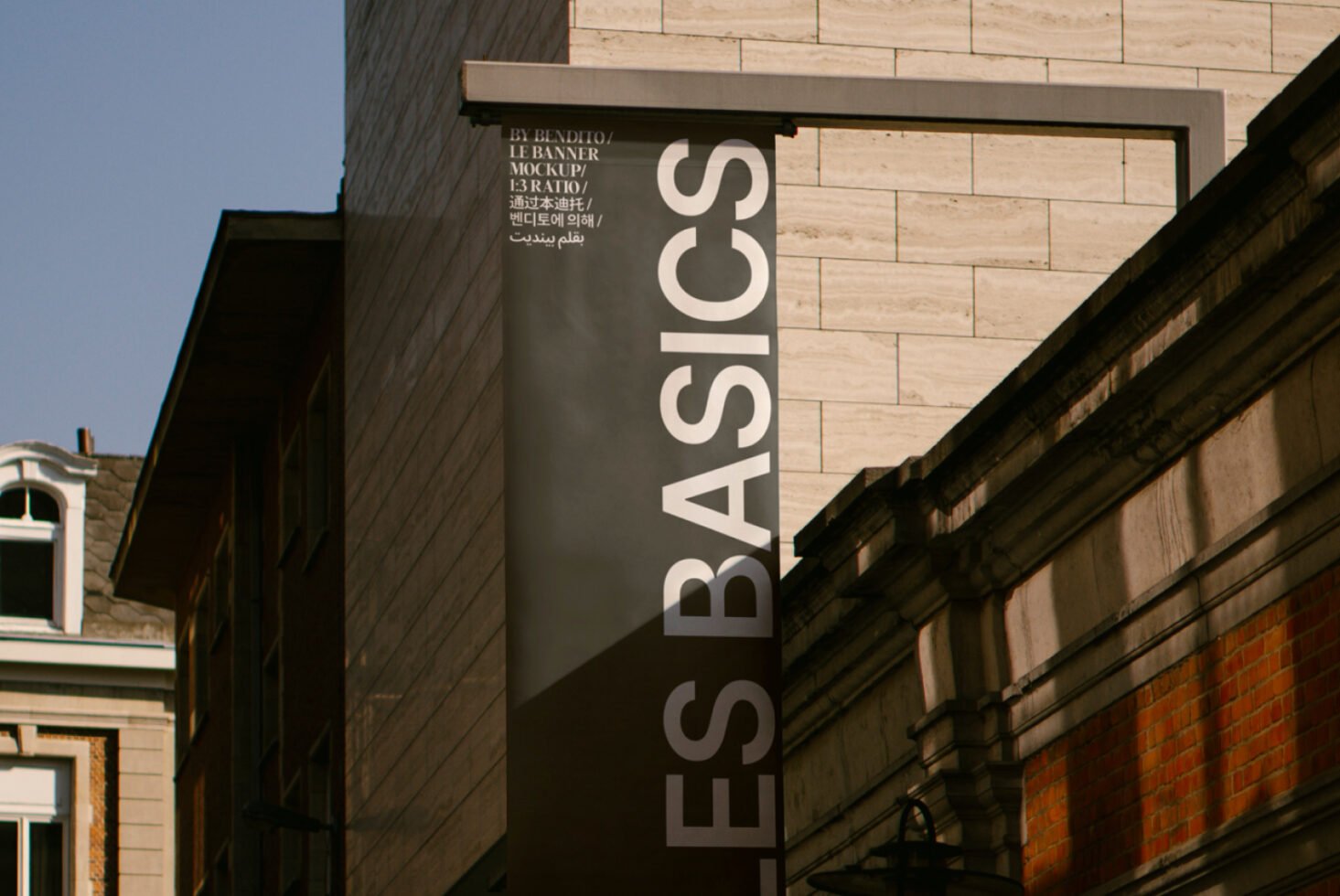 Street banner mockup hanging on building exterior, showcasing vertical design with basic text. Ideal for urban advertising graphics. Editable PSD template.