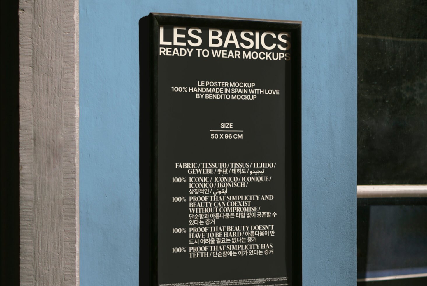Outdoor mockup poster on textured blue wall showcasing design details in multiple languages; perfect for creative mockup presentations and visual graphics.