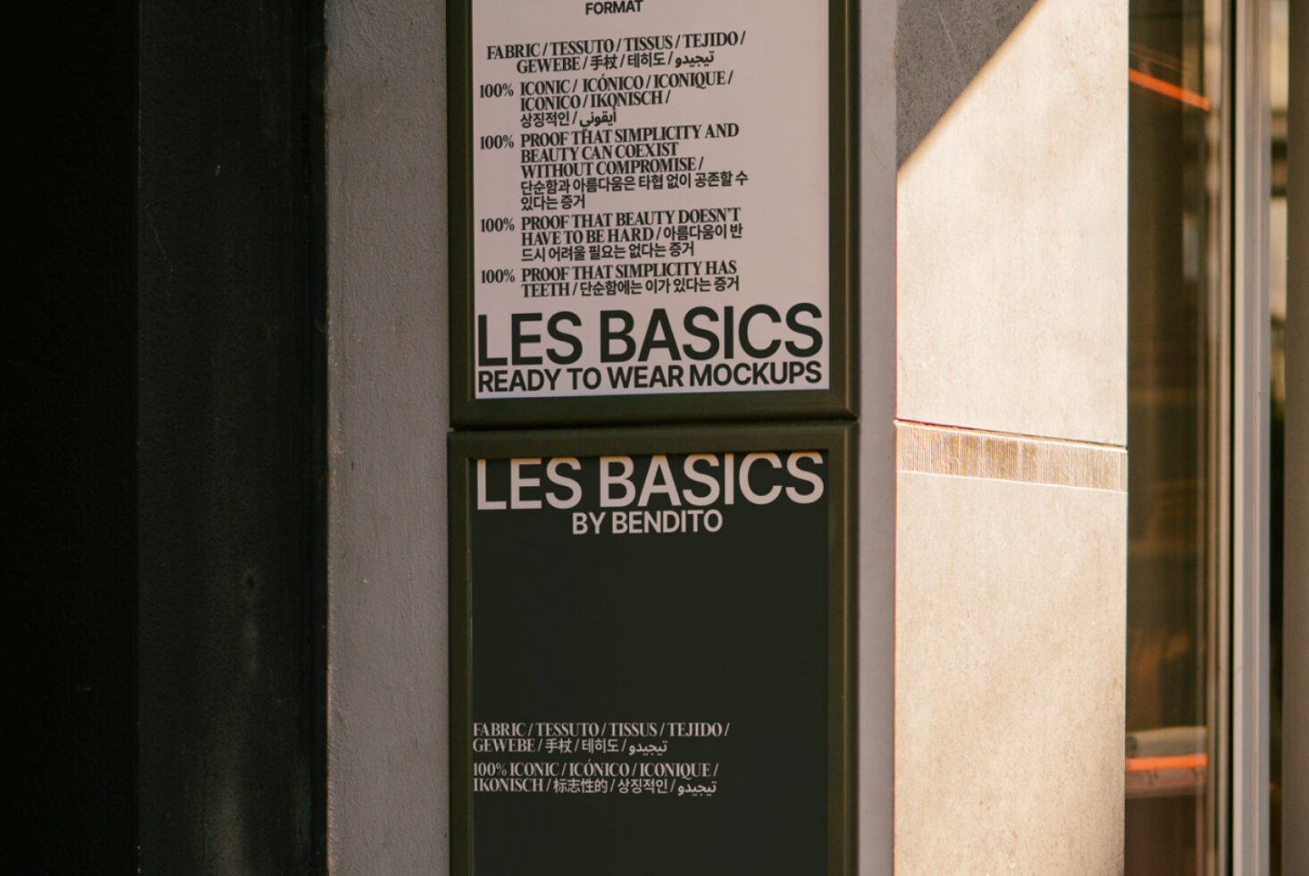 Street sign featuring Les Basics ready to wear mockups by Bendito on a building facade suitable for graphic designers seeking modern design elements.
