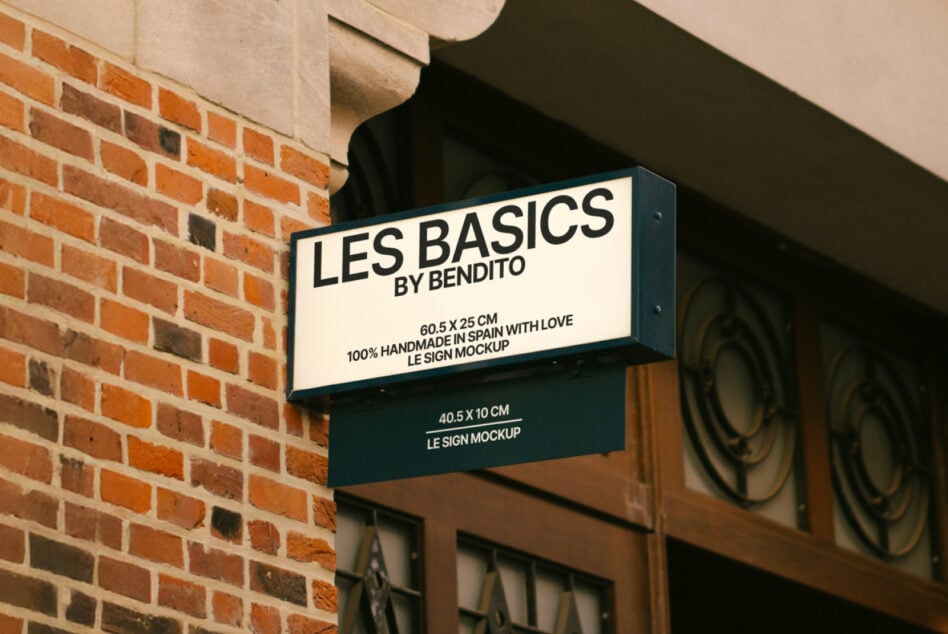 Storefront sign mockup on brick wall for designers featuring customizable text options perfect for branding presentations and visual merchandising displays