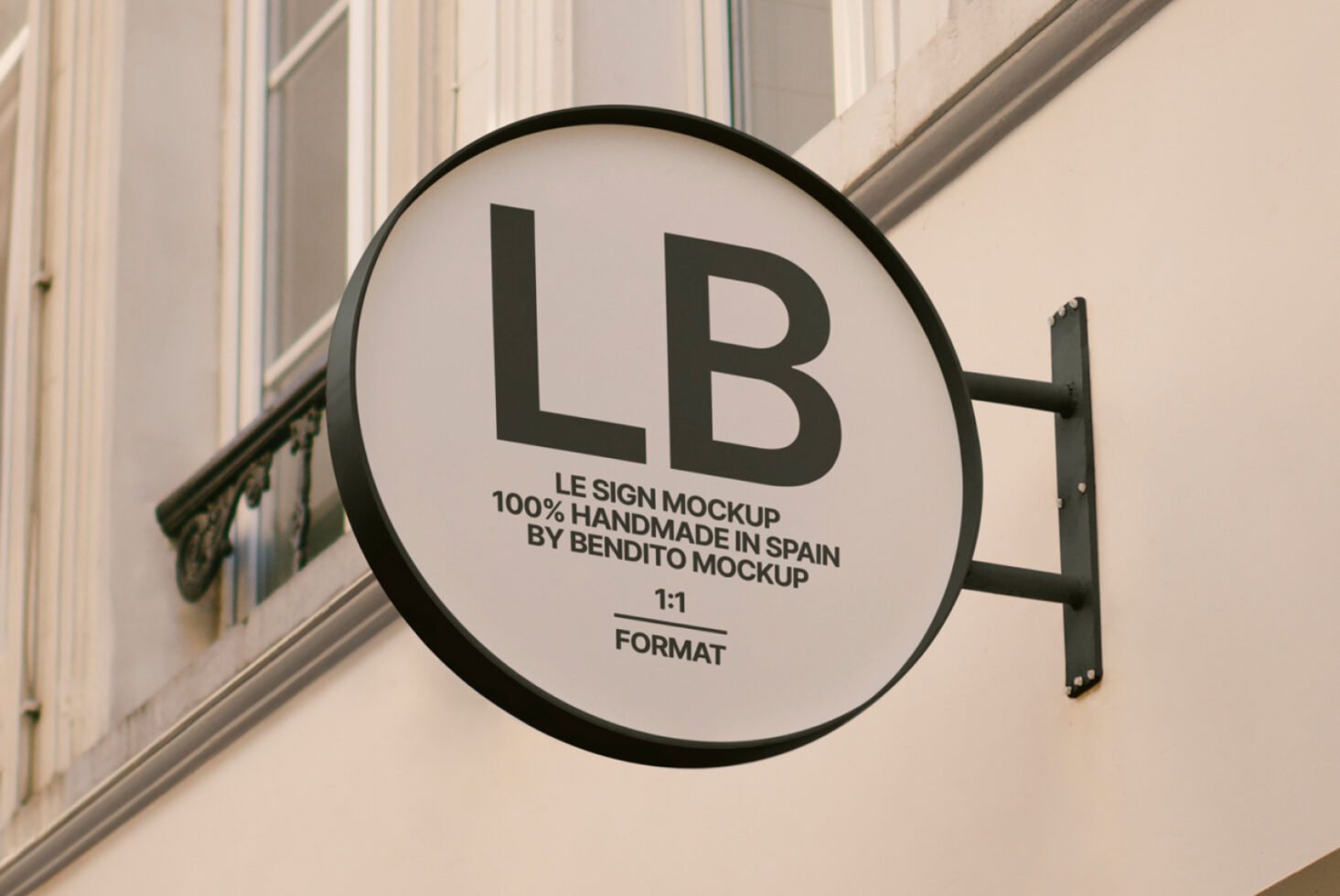 Round storefront sign mockup displayed on an exterior wall suitable for graphic design presentations and branding projects. Design assets for designers.