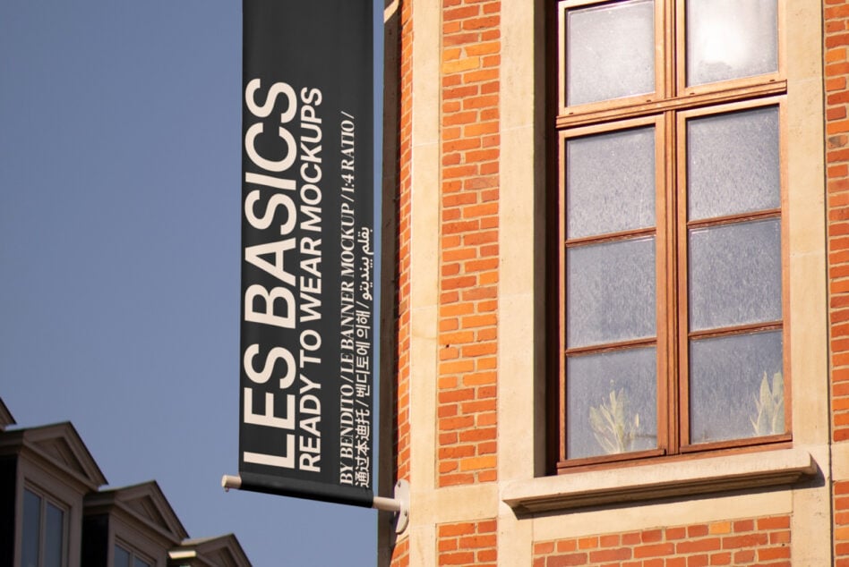 Ready-to-wear mockup dark banner on brick storefront with mullioned windows