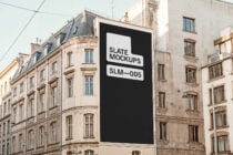 Urban billboard mockup on a building facade showcasing a large display for designers. Ideal for ad presentations, cityscape backdrops, architectural context.