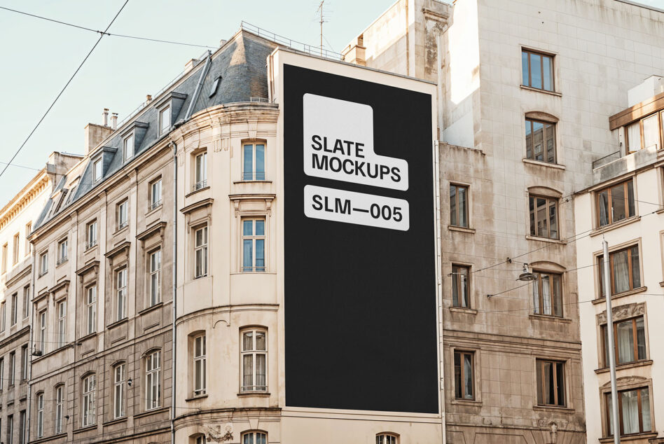 Tall vertical black sign on Parisian building with white text reading Slate Mockups