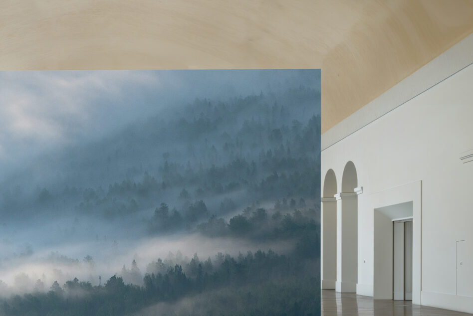 Minimal interior with foggy forest canvas on white gallery wall