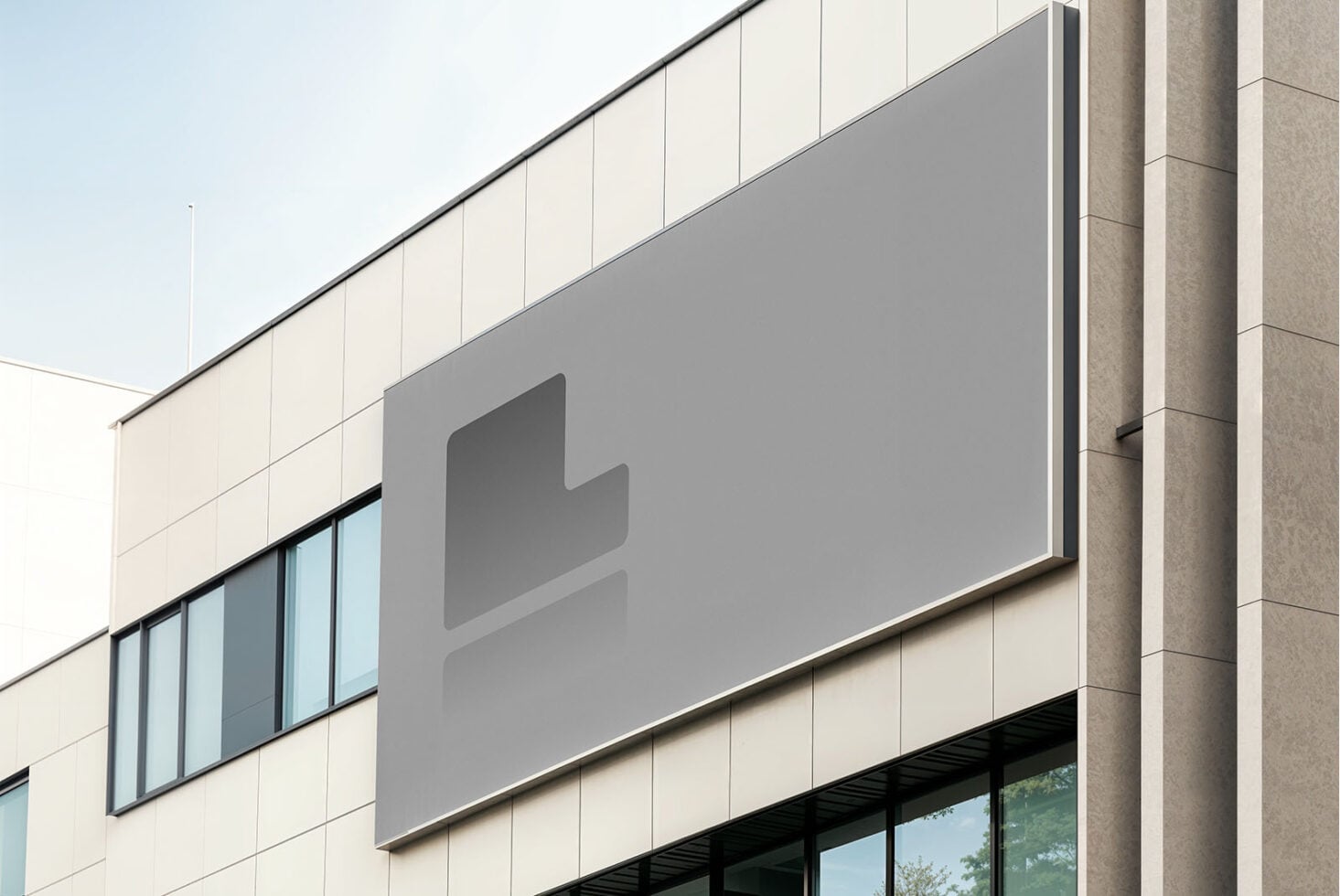 Minimalist outdoor signage mockup on contemporary architecture with stone detailing