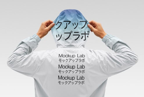 Back view of person in hooded jacket featuring Mockup Lab text in English and Japanese. Ideal for mockup design, branding assets, or graphic templates.