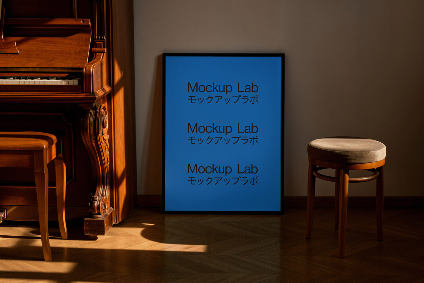 Mockup poster frame leaning against a wall in dimly lit room with wooden piano and stool. Minimalistic interior design mockup for graphic presentation.