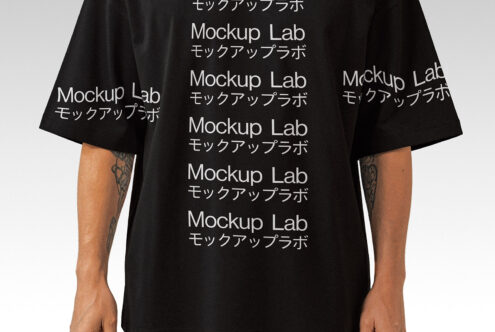 T-shirt mockup featuring a person wearing a black shirt with repeated Mockup Lab text in English and Japanese. Ideal for apparel design presentations.