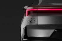 Car tail light mockup with bright magenta neon accent, metallic gray body section