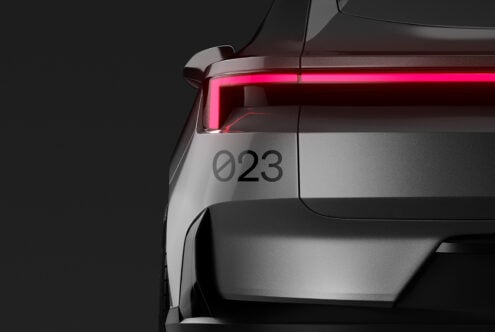 Sleek modern car back design with red taillight on dark background ideal for graphic designs mockups vehicle branding automotive digital assets