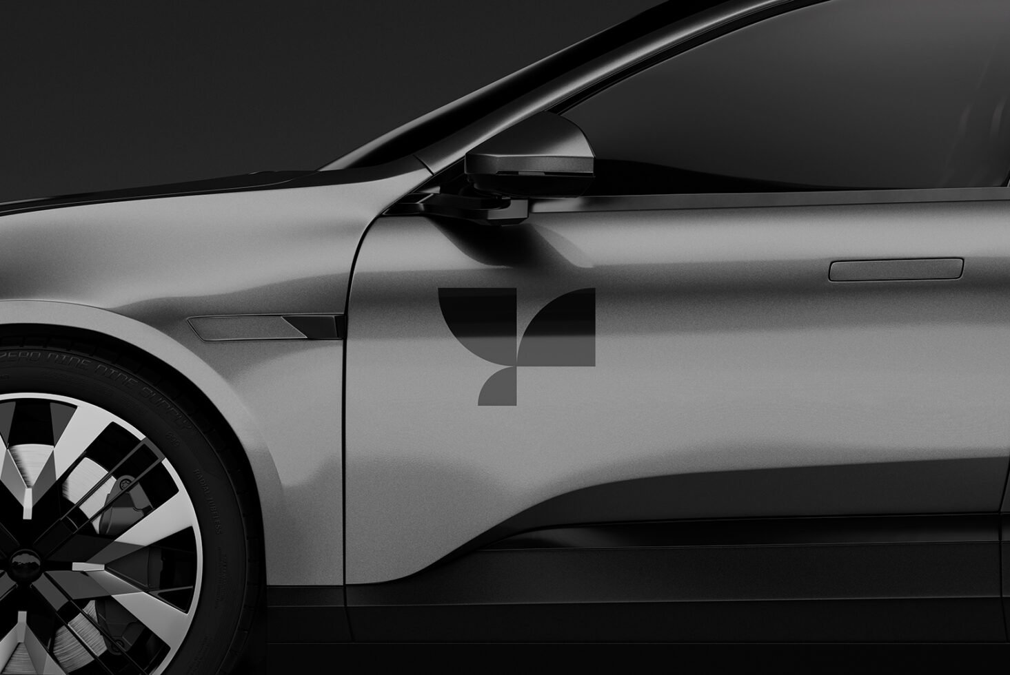 Side view of a sleek car with a minimalist logo on the door. Monochrome mockup ideal for automotive graphics, branding projects, design templates.