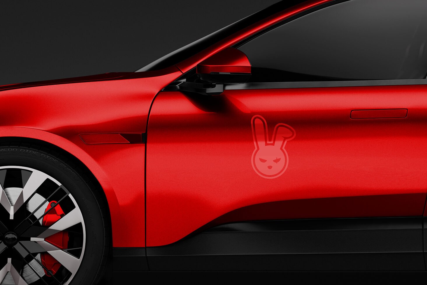 Red car side view with custom bunny graphic logo mockup. Sleek modern design with black accents ideal for automotive branding or creative projects.