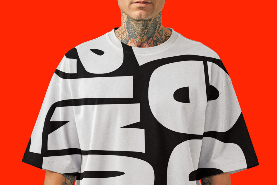 Close up of chest wearing white shirt with black abstract line graphic
