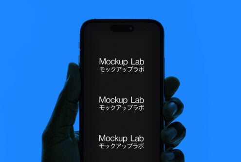 Mobile mockup design showing a hand holding a smartphone with blue background. Ideal for designers needing realistic phone display presentations mockups.