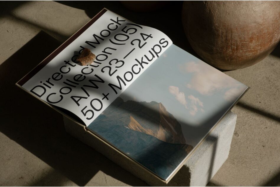 Open book mockup with scenic mountain imagery on right page