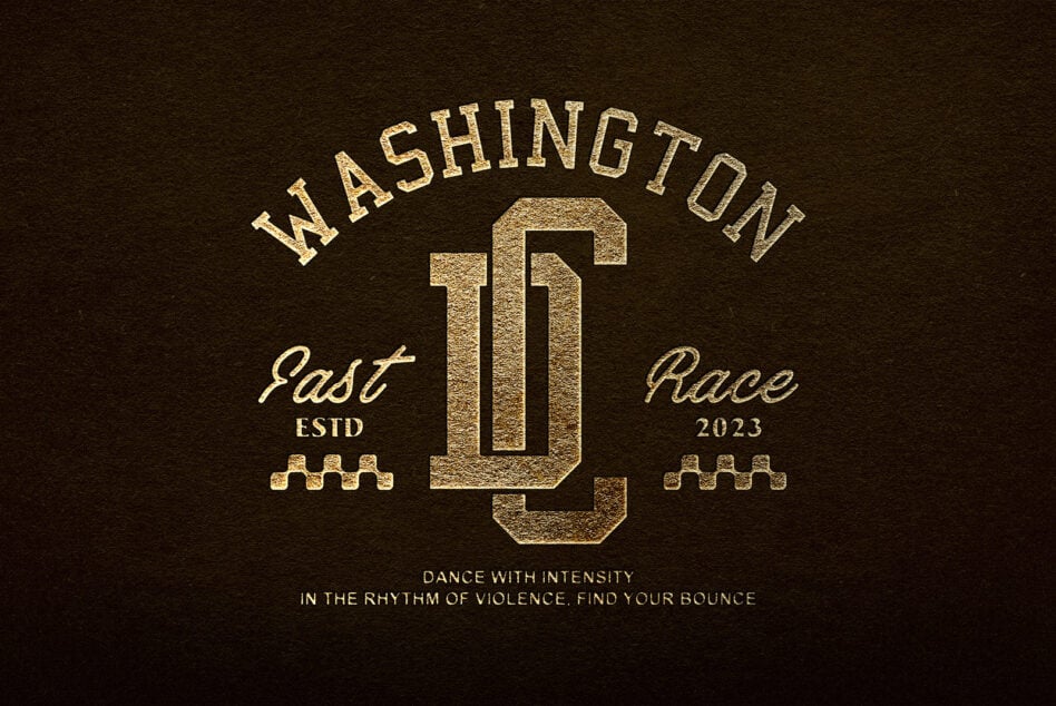 Gold embossed Washington D Race emblem with castle motif on dark fabric