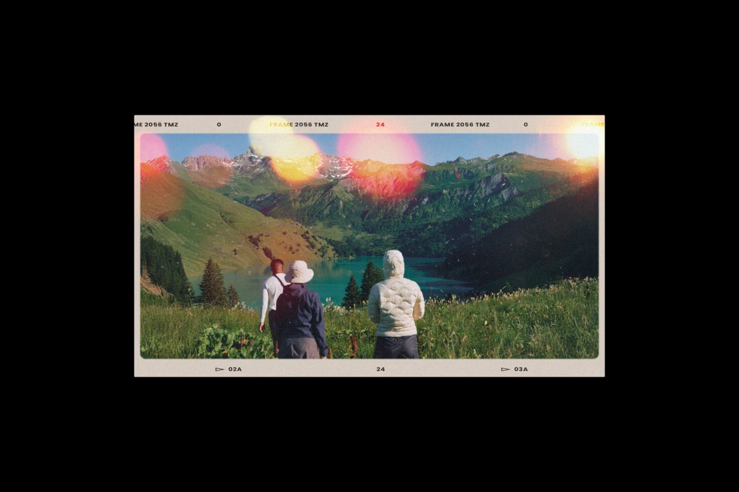 Three people in outdoor gear admire a scenic mountain landscape with a lake; film-style border; ideal for nature-themed mockups or graphic designs.