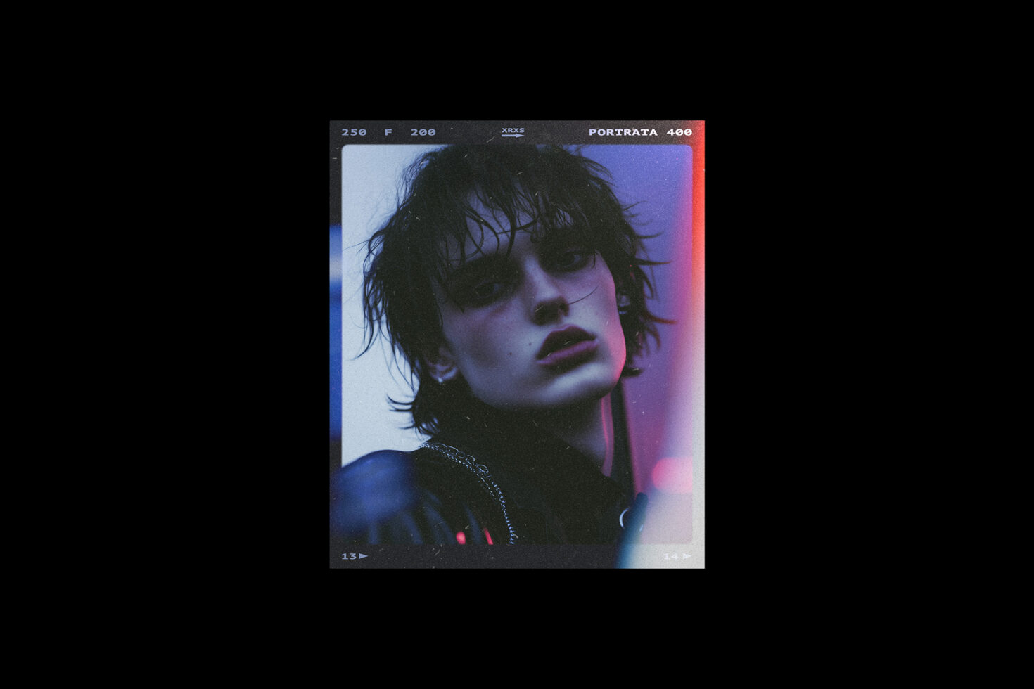 Moody fashion portrait featuring a person with wet hair and dramatic makeup. Neon lighting creates a retro aesthetic. Perfect for graphic design inspiration.