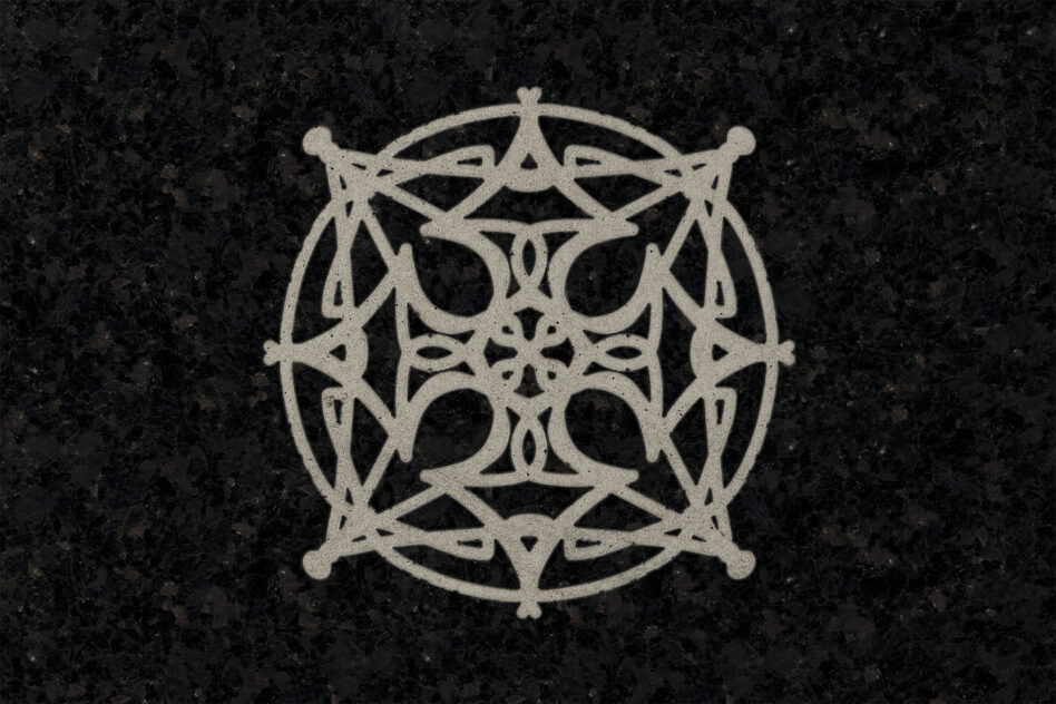 Ornate serif monogram with vintage decorative elements on black grunge background