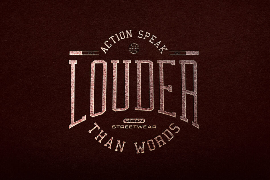 Distressed metallic badge reading Louder Urban Streetwear on maroon backdrop