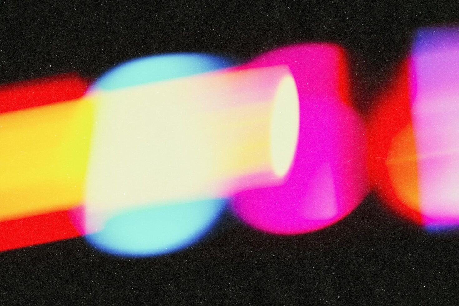 Abstract colorful light blur graphic with red blue yellow pink hues, ideal for design assets, templates, backgrounds, creative visuals, digital art.