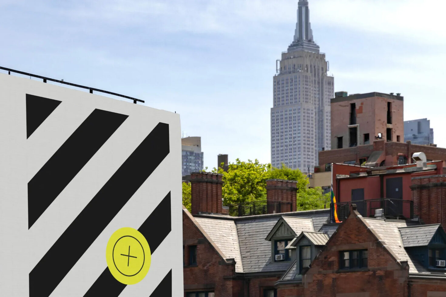 Urban billboard mockup in city environment featuring skyscraper in background ideal for designers seeking realistic outdoor advertising templates graphics
