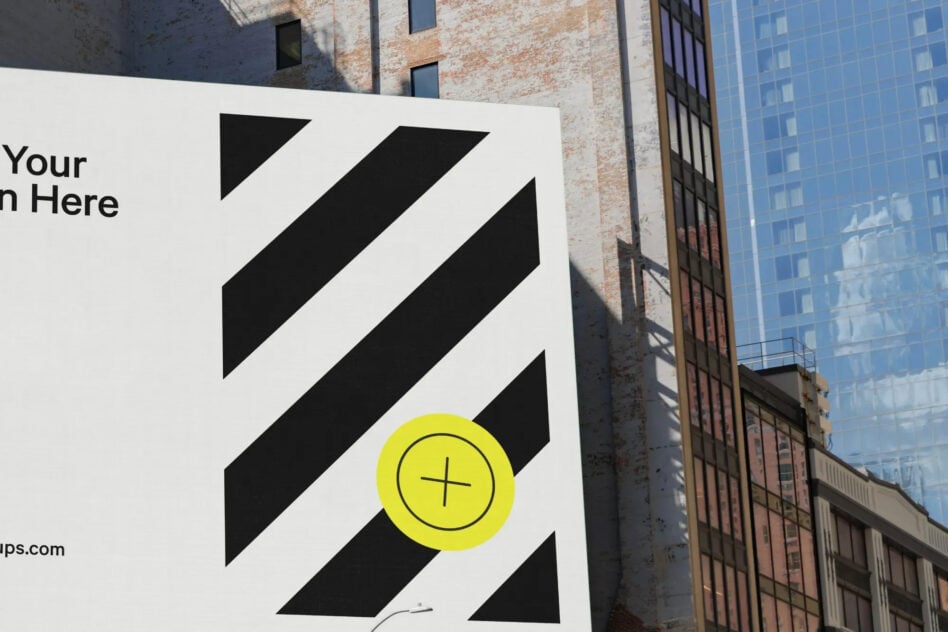 Urban billboard mockup on building wall with customizable design space. Geometric pattern graphics. Ideal asset for marketing and branding visuals.
