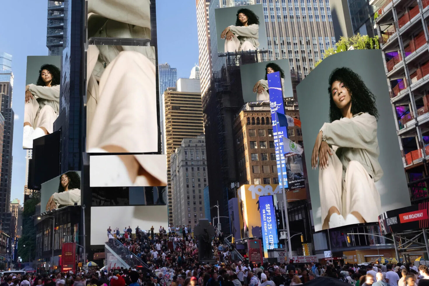 Urban cityscape with digital billboards displaying fashion mockup design, featuring modern apparel, downtown vibe, targeted for graphic designers seeking inspiration.