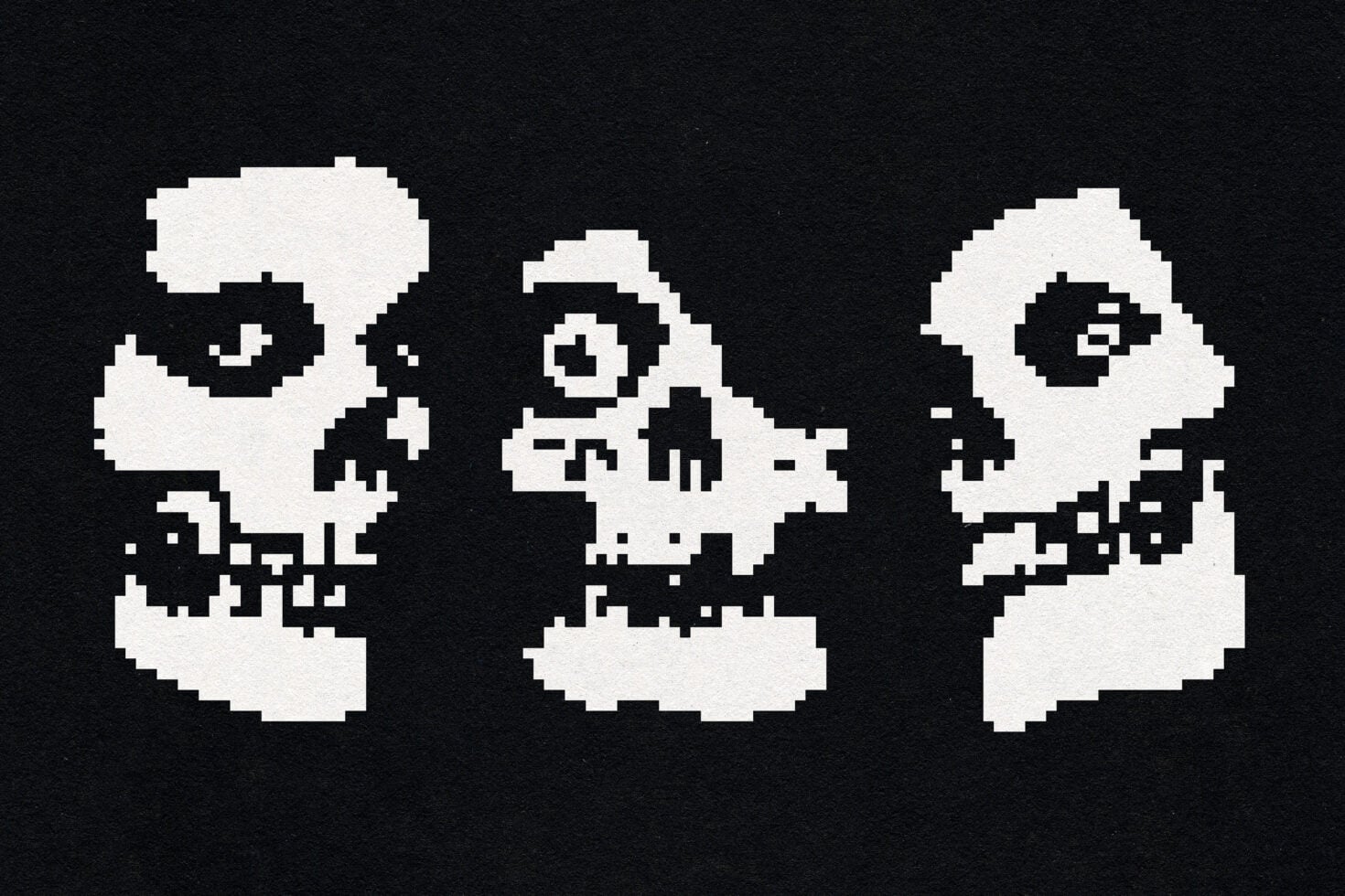 Three pixelated demon faces with horns on black background, 8-bit style