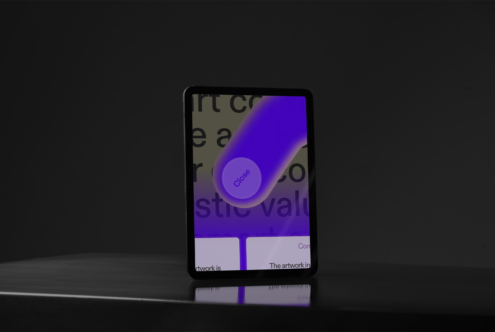 Tablet displaying modern graphic design with bold typography and vibrant colors. Ideal for digital mockup templates. Perfect for designers seeking inspiration.