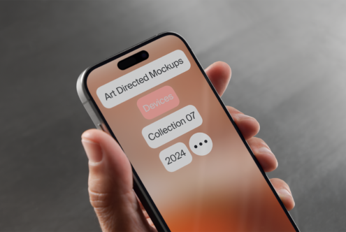 Person holding smartphone showing mockup interface with text Art Directed Mockups Devices Collection 07 2024. Ideal for designers seeking device templates.