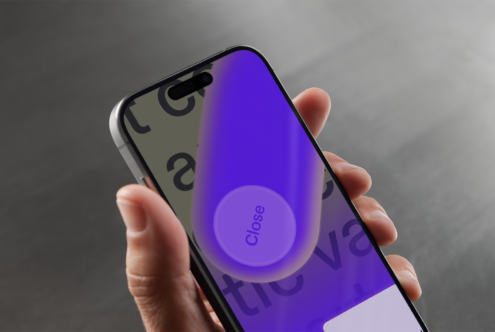 Smartphone mockup held in hand showcasing UI design with vivid purple gradient and typography. Ideal for designers seeking modern app interface templates.