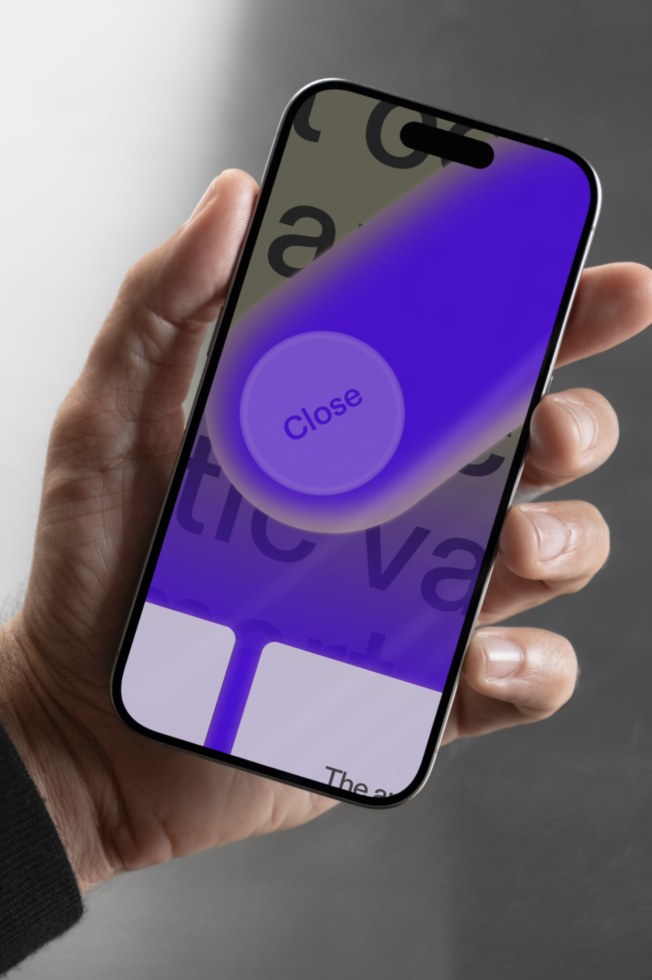 Hand holding smartphone displaying abstract purple design with bold text and close button digital mockup for designers UI UX template resources