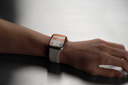 Mockup of a smartwatch on a person's wrist displaying an app interface. Digital design asset for designers creating tech graphics and UI templates.