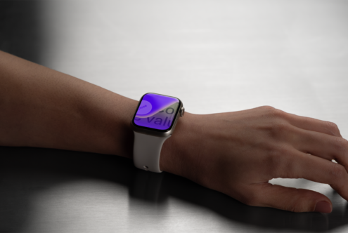 Smartwatch mockup on wrist with silver case and white band against metallic background ideal for tech product designers and digital asset creators.
