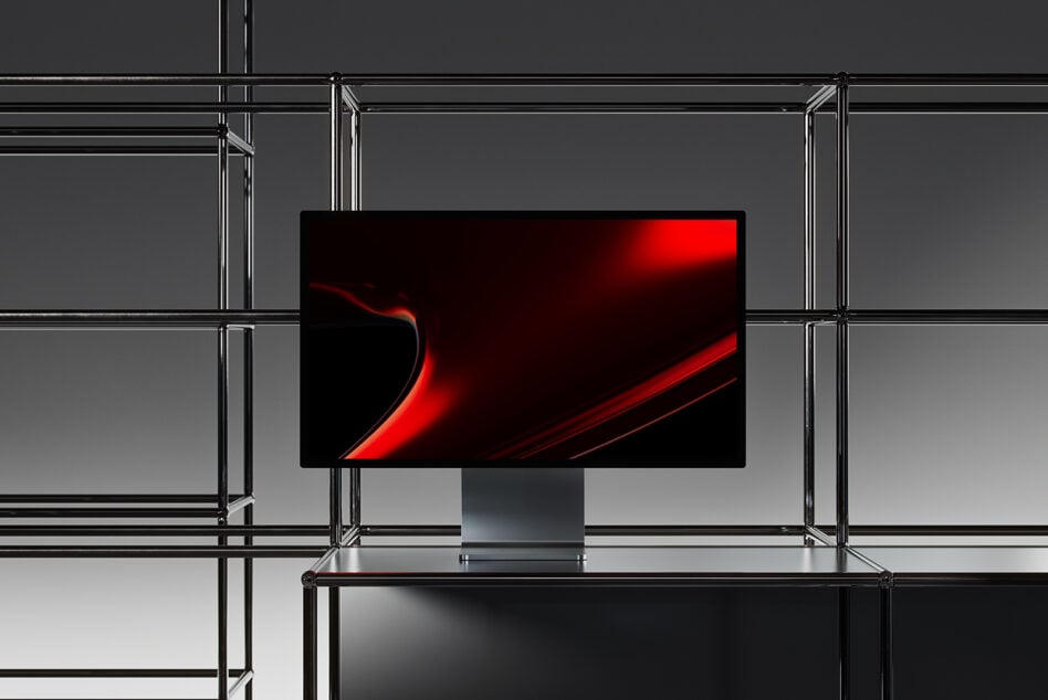 Metal frame display stand with monitor showing red swoosh graphic design
