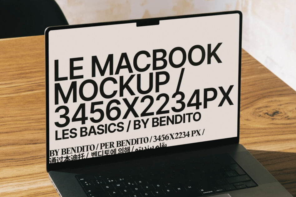 MacBook mockup with light screen on wooden desk, black typography overlay