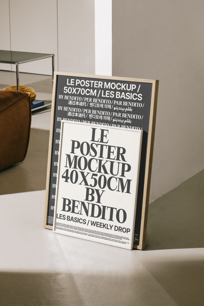 Single framed poster leaning on minimalist shelf with brown vase nearby