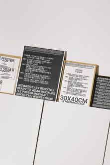 Multiple poster mockups in wood clips on white background, various sizes