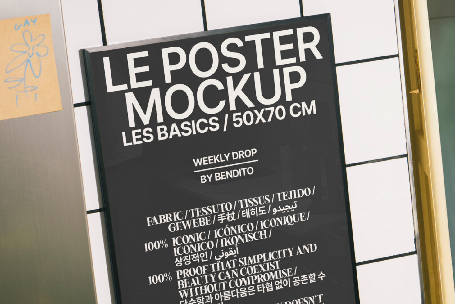 Black poster mockup on grid wall with gold frame, sketched yellow card visible