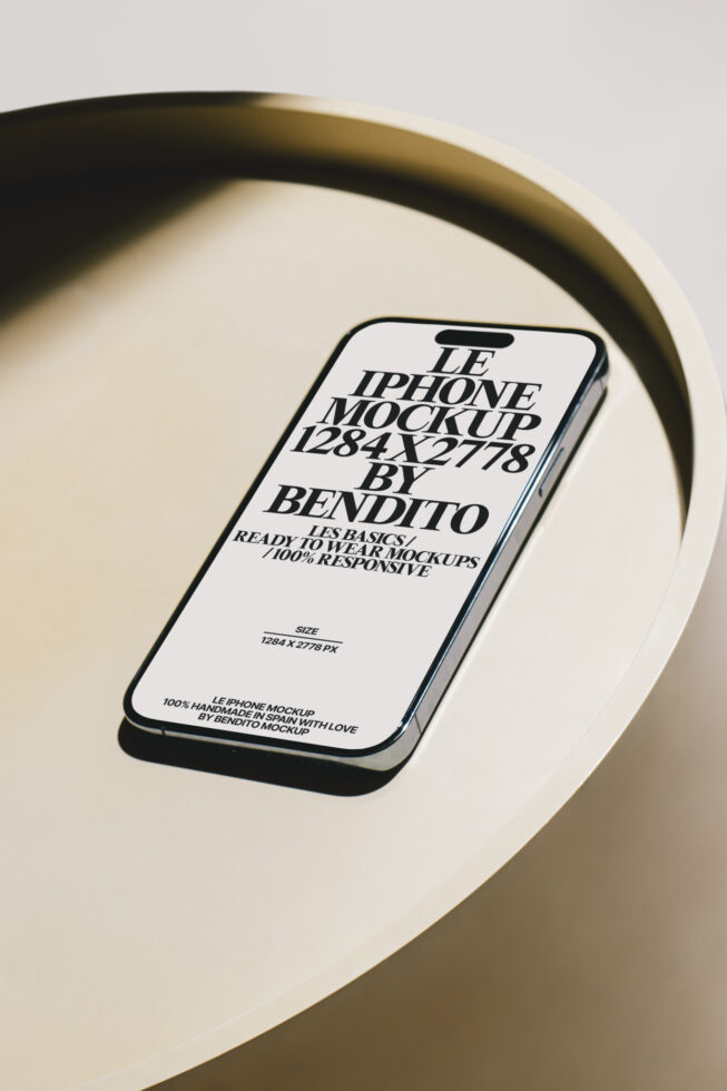 White iPhone mockup centered in cream circular tray, overhead shot