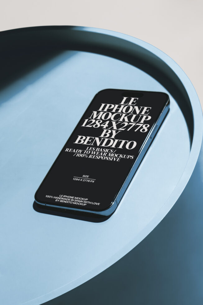 Black iPhone mockup centered in blue circular tray, overhead shot