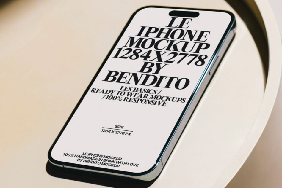 Light blue iPhone with white screen showing serif font mockup design