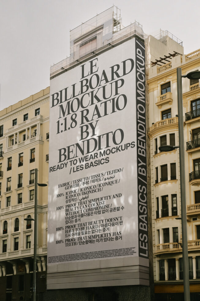 Urban billboard mockup showcasing designer typography with a 1:1.8 ratio by Bendito. Ideal for designers seeking realistic large-format display templates.