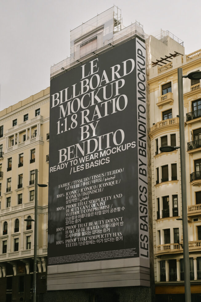 Large urban billboard mockup on a building facade in cityscape. Ideal for advertising design showcases. Keywords: mockup, billboard, urban, cityscape.