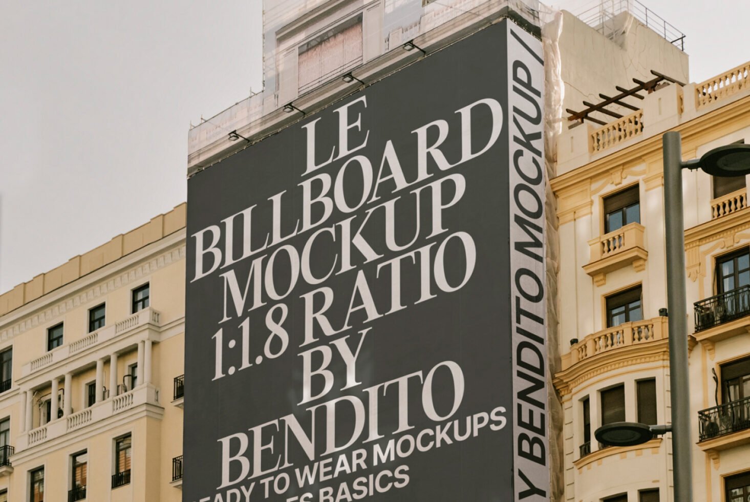 Urban building billboard mockup with text overlay in 1:1.8 ratio. Perfect for designers seeking editable templates and striking graphic mockups.