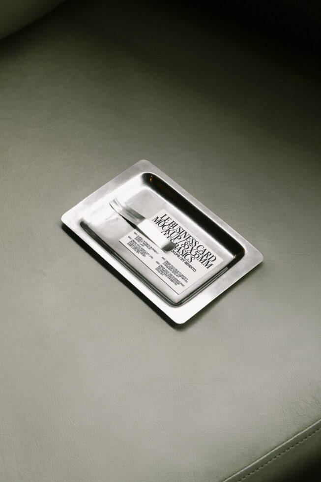 Business card mockup on silver tray background. Minimalistic design template. Ideal for branding presentation. Mockups category for designers.