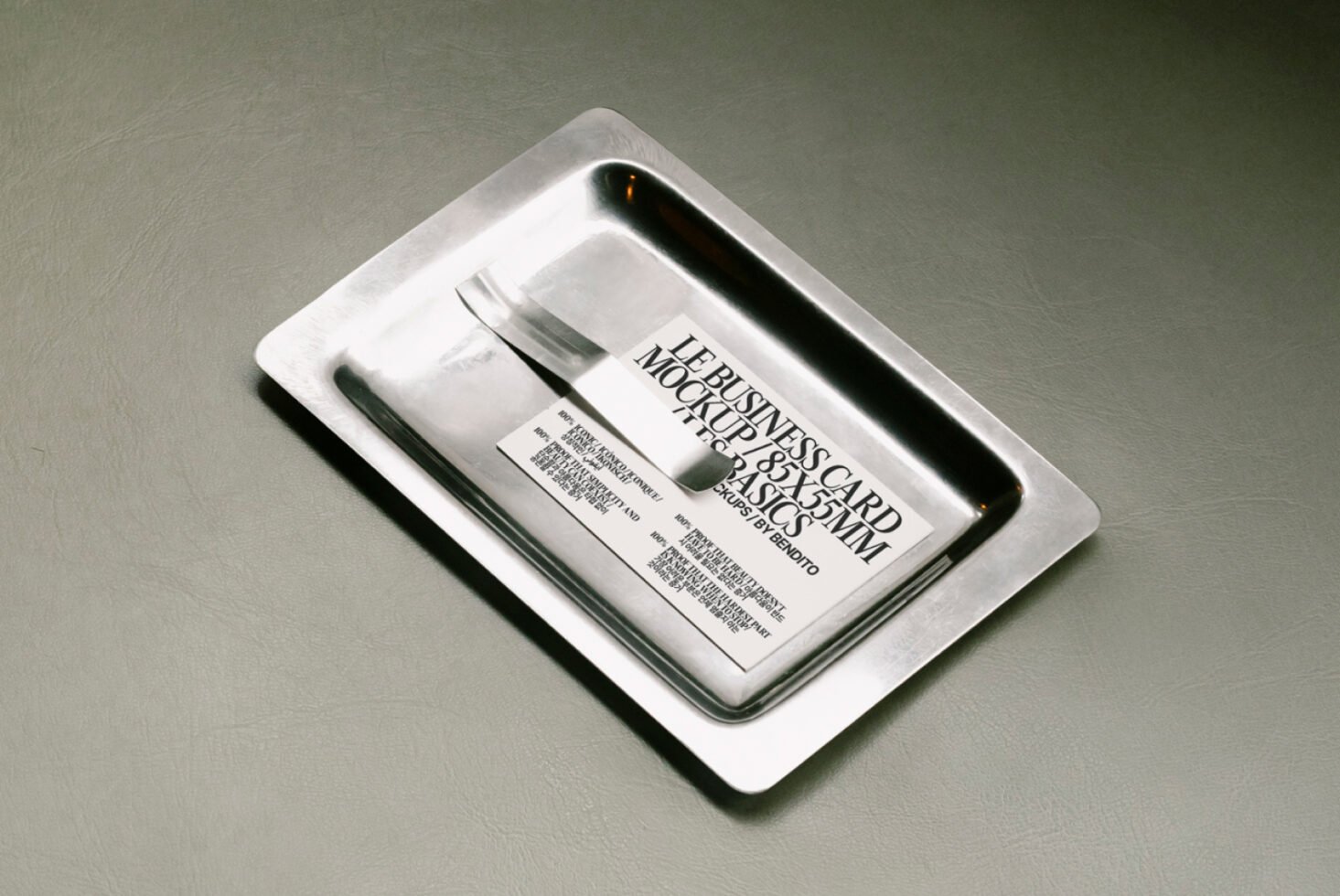 Business card mockup on a metallic tray showcasing minimal design. Ideal for designers seeking high-quality branding presentations and marketing visuals.