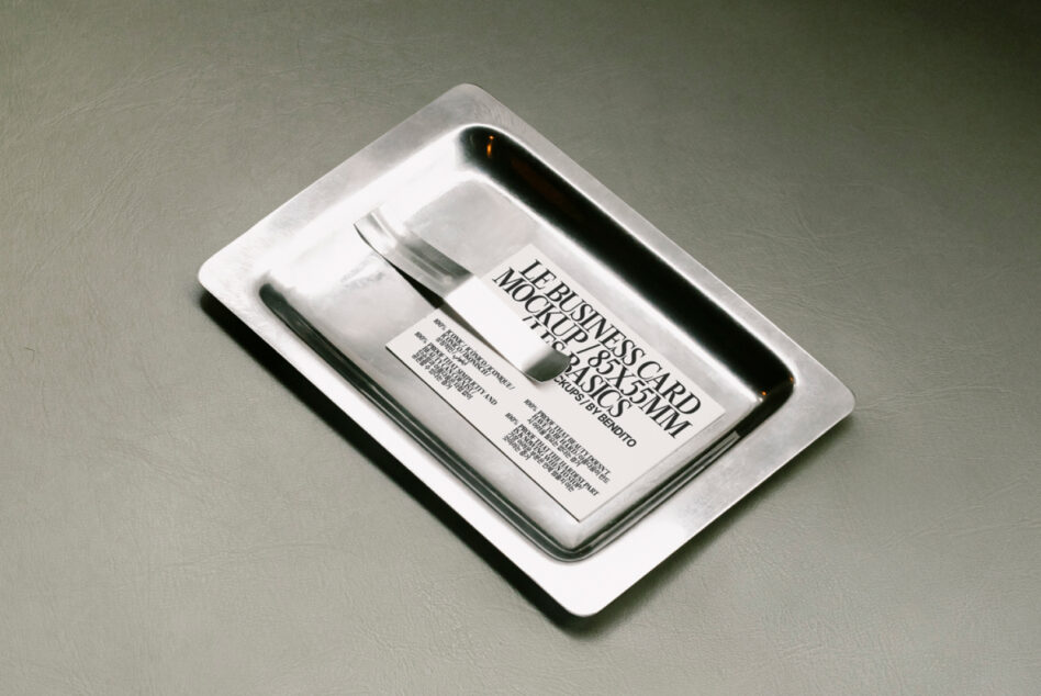 Business card mockup on a metallic tray showcasing minimal design. Ideal for designers seeking high-quality branding presentations and marketing visuals.